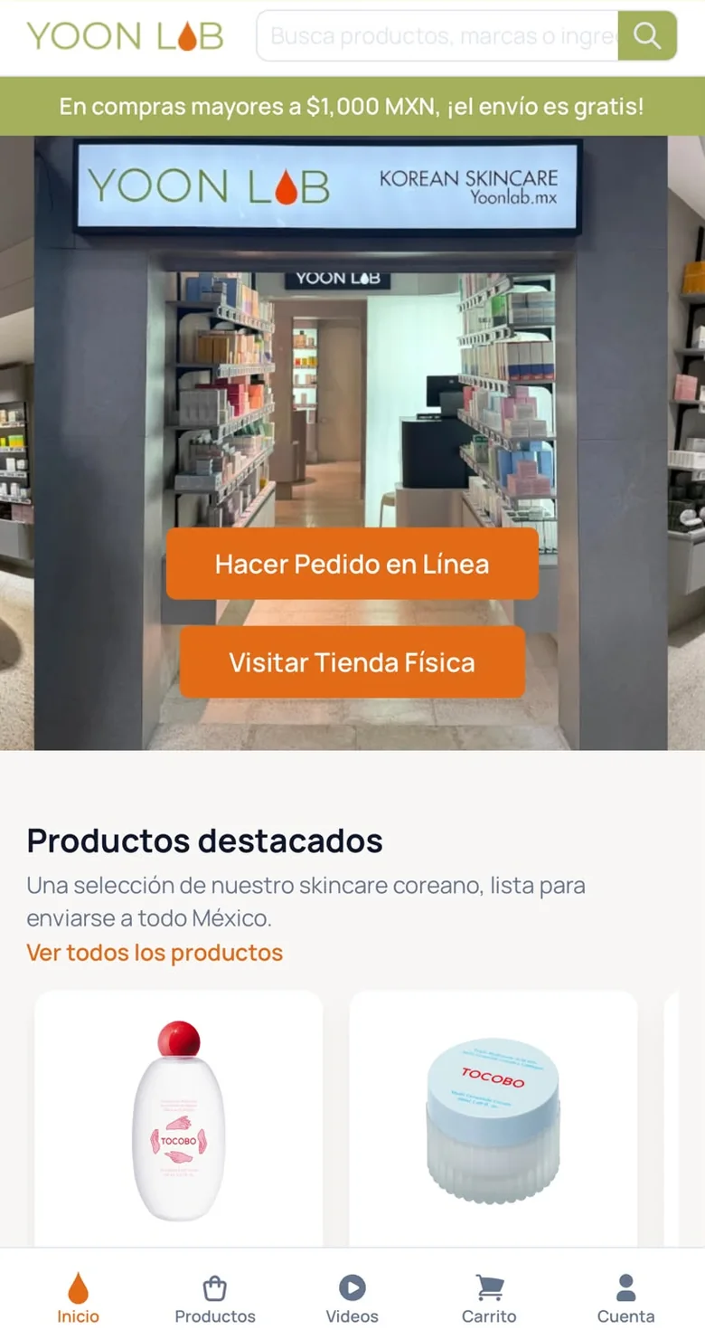 The Yoon Lab home screen on a phone, in Spanish, showing the physical store, online ordering and featured products